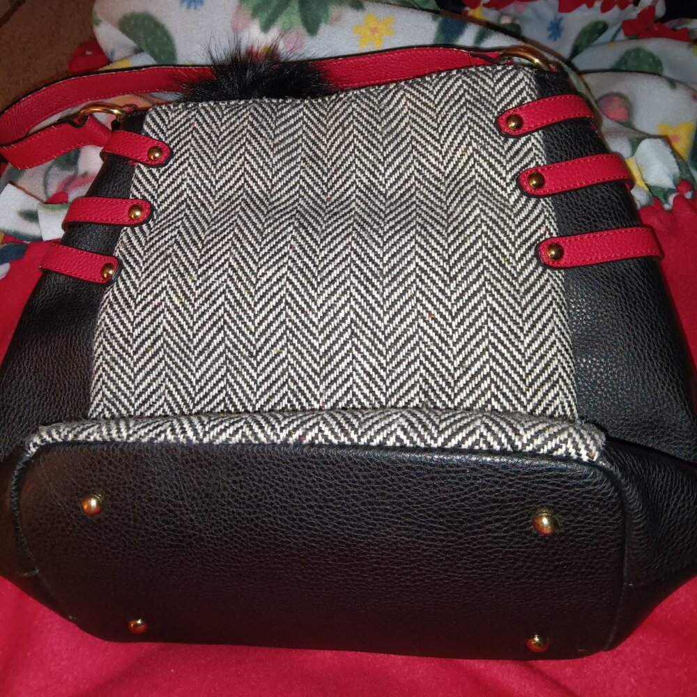 Black & white bucket purse with red accents